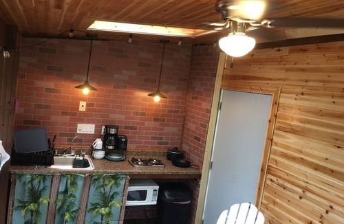 Fern Forest Cabin | tiny home 1- with kitchen equipped with essentials near at the Volcano Park!