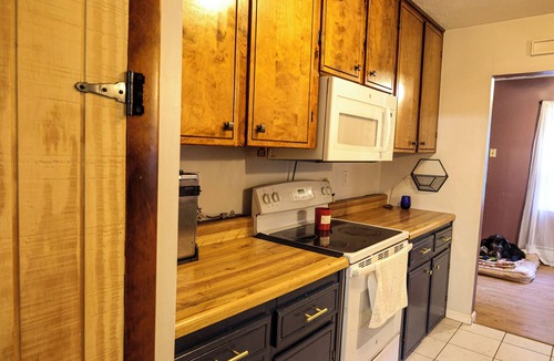 Old Town House | Tiny Home, Big Character. Close to Town, Lake, and Trails! Pet-Friendly!
