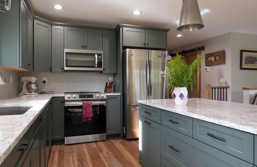 Ingalls House | Unhurried Rapids Hideaway; charming 2 bedroom home with lower level bunk area.
