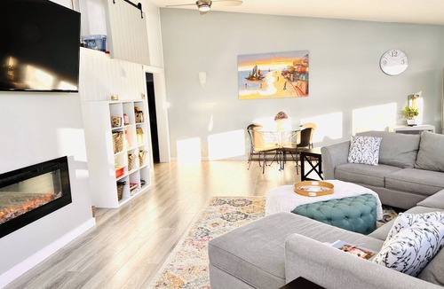 Clayton House | Walkable, modern, spacious village home, dockage, hot tub, fenced in yard.