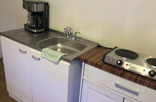 Stone Mountain House | Welcome to your cozy full-studio basement suite offers comfort and privacy