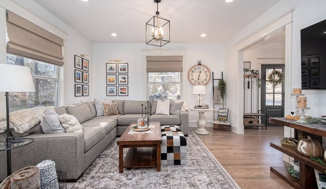 4 bedroom/2.5 bath restored 1910 beauty minutes from main KU campus & downtown.