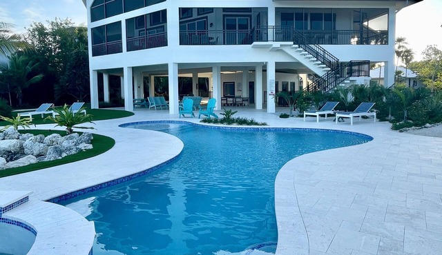 5 bedrooms, Heated/Chilled Pool, Open Water Views, Boat Dockage, Sleeps 13-15,