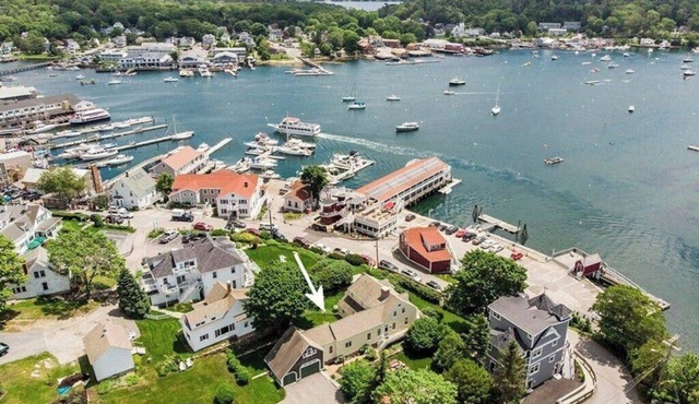 All-suite Boothbay Harbor home with deck, ocean views, and fireplaces