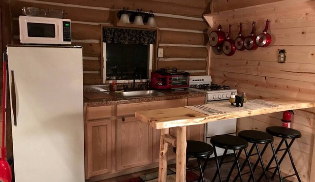 Authentic Log Cabin Rental for a Family Camping Getaway near Chase Lake, New York
