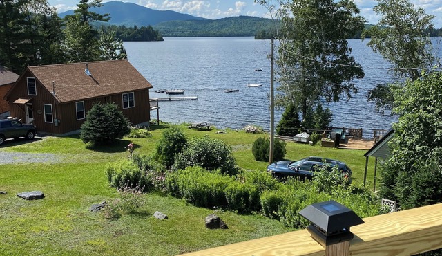 Beautiful lakefront camp with sunset view over big moose mountain