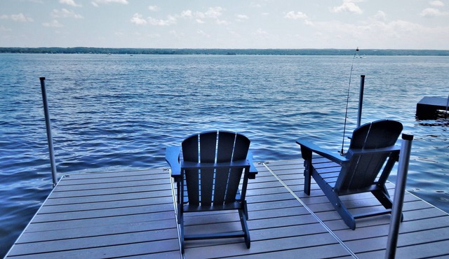 Calm on Cayuga. Lakefront home on Cayuga Lake with dock and screened in porch