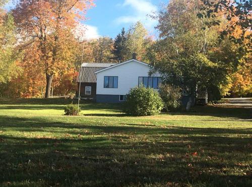Embrace Nature in this Breathtaking Cottage in Portage Lake, Maine