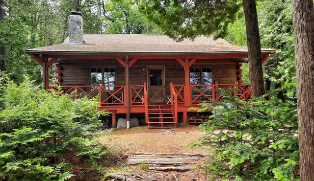 Escape to Howie's Camp: Unwind and Recharge at This Lakefront Log Cabin
