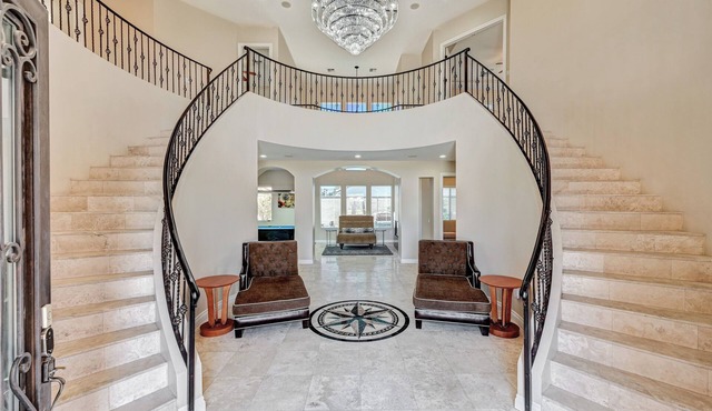 Gorgeous Double Staircase with over 5,100 Sq Ft! 4 miles To The Strip! Pool!