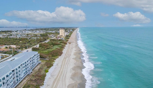 Harbor Island beach house with private and public pools.