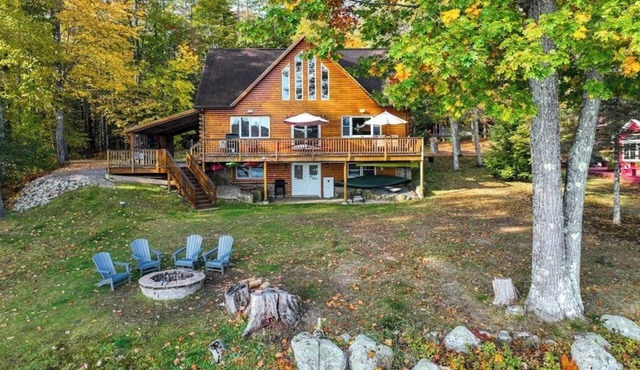 Lakefront, dog-friendly home with dock, kayaks, SUPs, canoe, huge deck & firepit