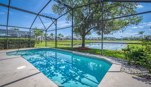 Lakefront Villa Near Disney with Pool & Gym Access