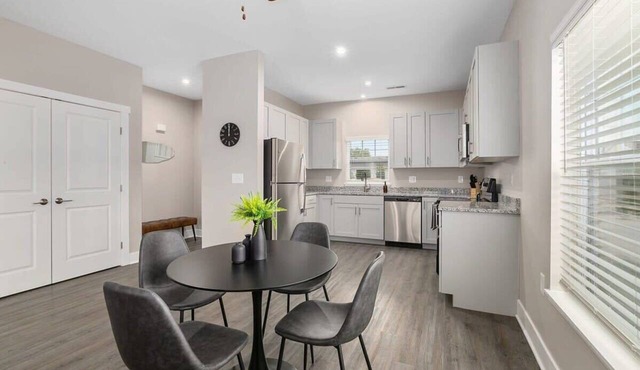 Modern 4BR 4BA Two Unit Condo w Garage and Patio