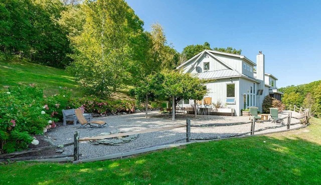 Modern Barn secluded in nature with Views for as far as the eye can see.