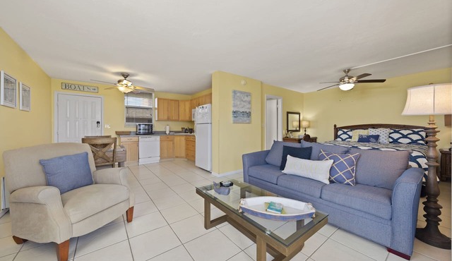 Penthouse water views! 4 minute walk across the street to the beach!