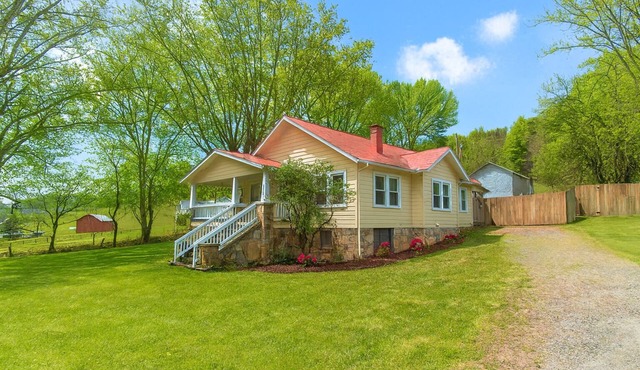 Private Mountain Cottage with Hot Tub, Fire Pit, and Fenced Yard Near Asheville