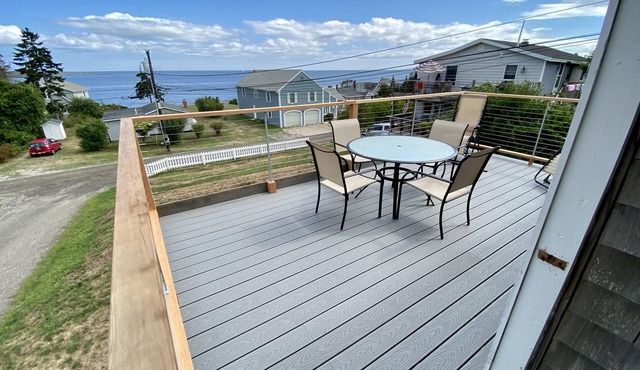 Recently updated cottage featuring beautiful easterly views of Casco Bay
