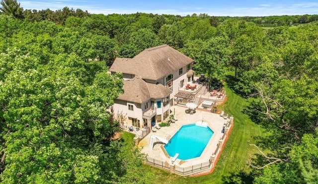 Riverfront vacation home with 2 full kitchens, a fitness center and sauna