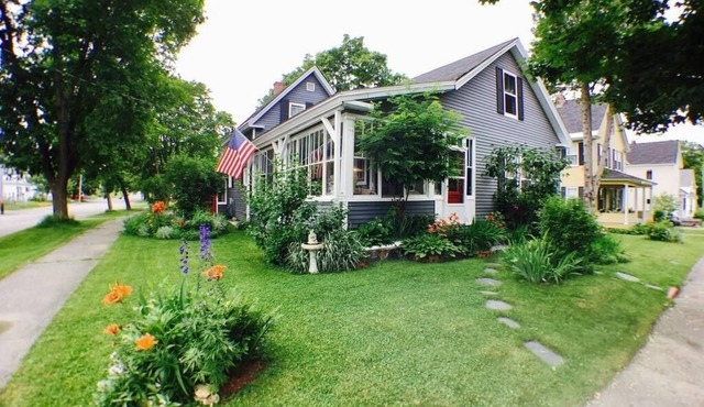 Snowmobiling, hiking, rafting paradise from this gorgeous Millinocket home