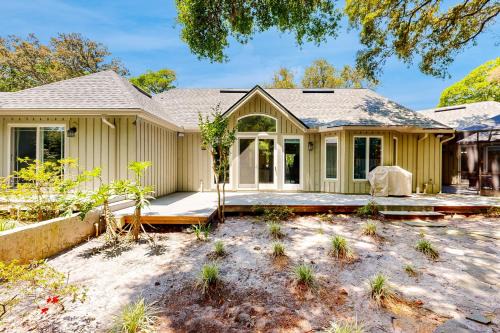 Spacious home with patio, deck, private outdoor pool, & beach access