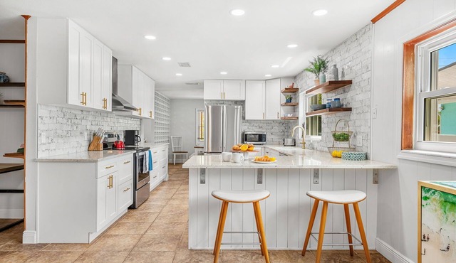 Tropical Retreat: Indian Harbour Beach Home with BBQ Grill, Fire Pit, Private Pool & Hot Tub! 🌴