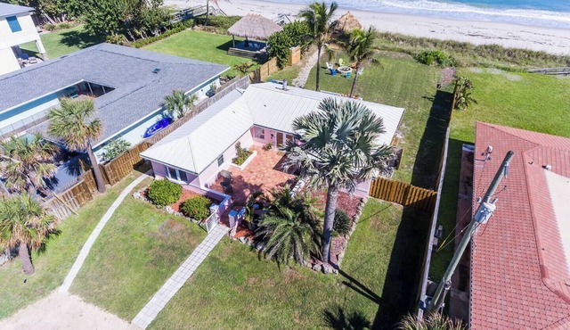 Welcome to “Salty Dog” - named after the old sea captain, this beautiful house directly on the Atlantic Ocean is decorated throughout with a nautical theme. With the breathtaking view of the ocean out your back door you will feel as though you are ac