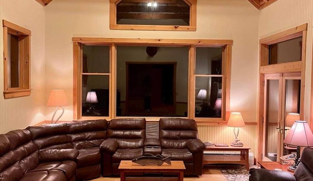 Well accommodated lakeside lodge with ITS trail access near West Forks, Maine.