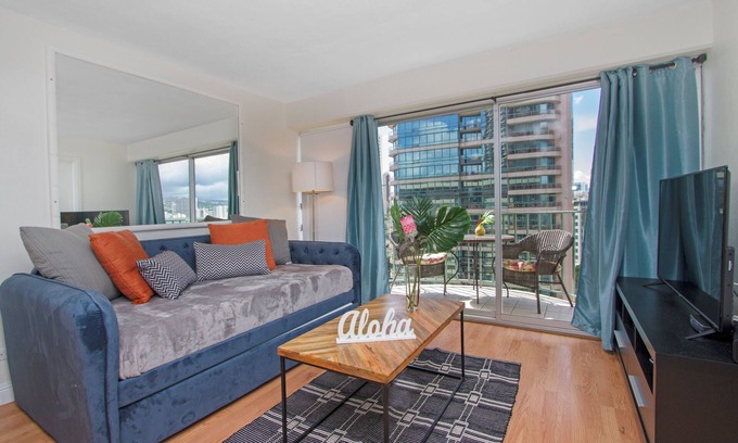 McCully - Moiliili Apartment | Cozy two bedroom, sleeps 6. Wifi, full kitchen, balcony, and pool.