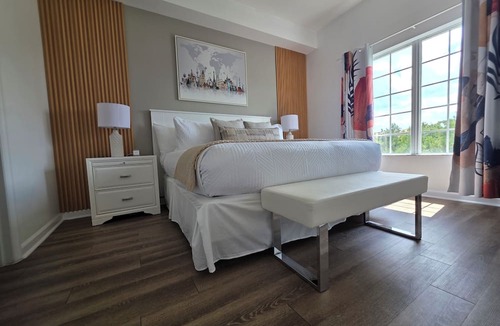 Florida Central Atlantic Coast Condo | Boutique Luxury Condo Private Balcony Lake Views Near Disney