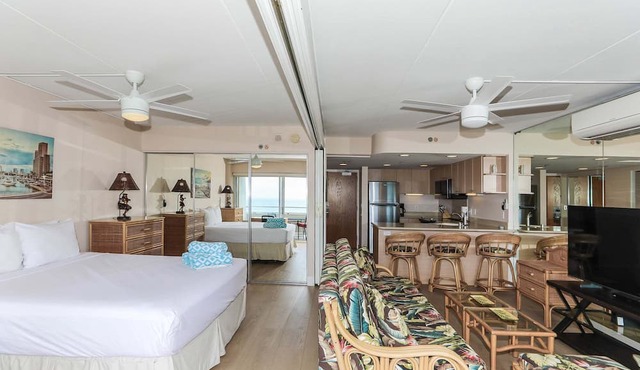 One-Bedroom Deluxe (Renovated) Unit with a view of the Duke Kahanamoku Lagoon and Waikiki Beach